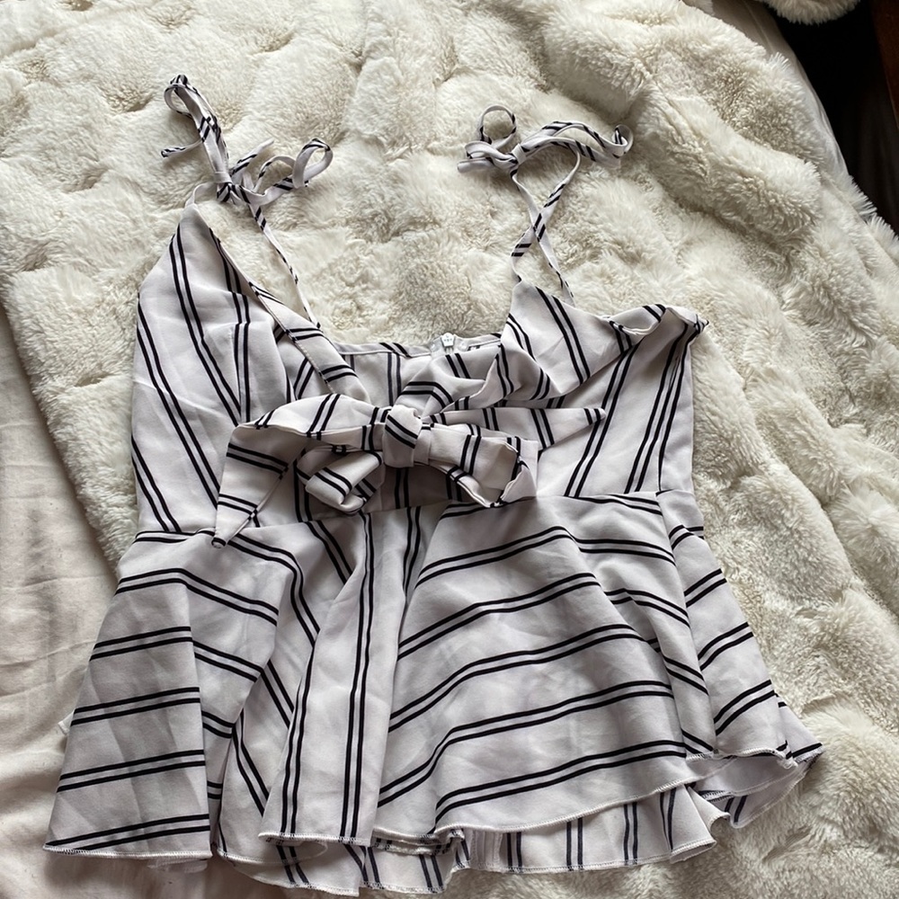 White striped top and not cropped that much shows an inch or two with ties